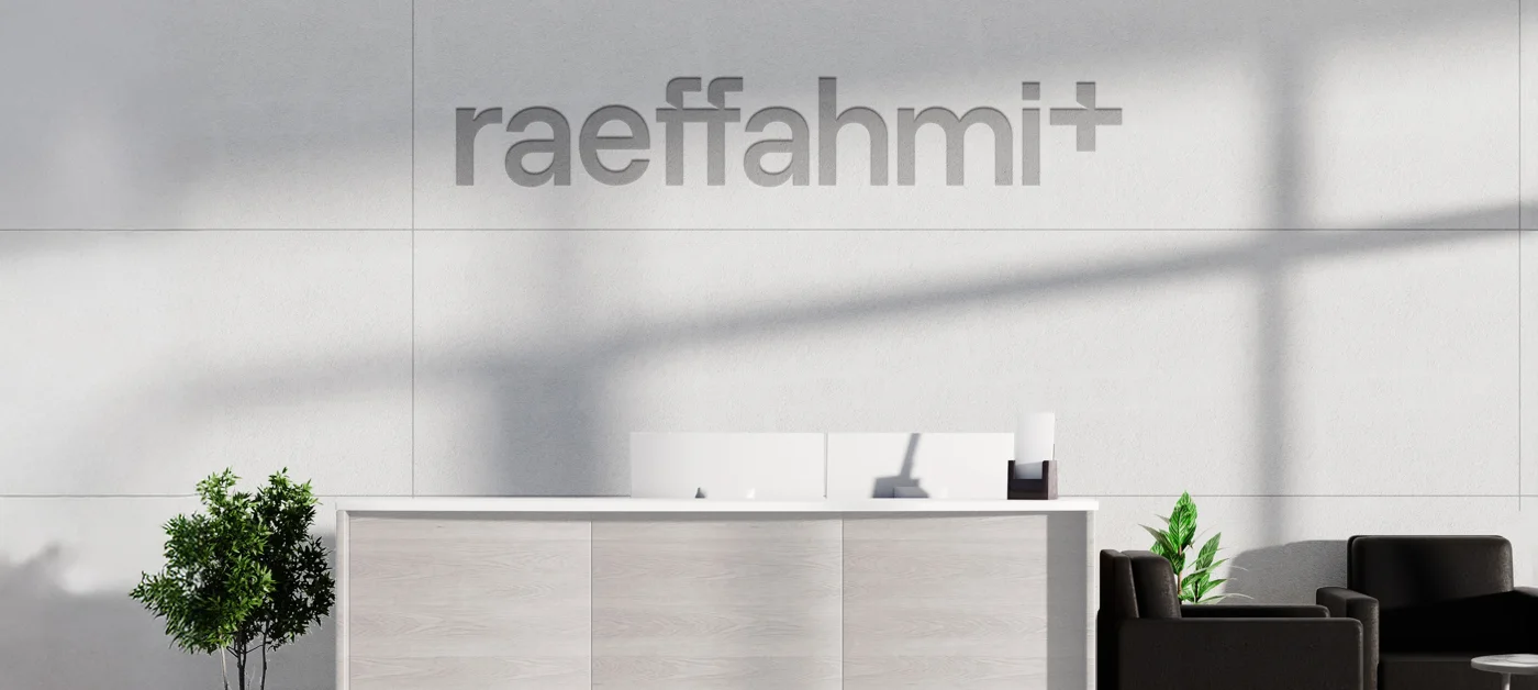 Reception signage shown in the brand identity application concepts